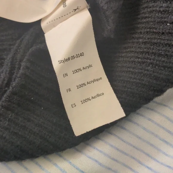 Black Off-the-Shoulder Sweater with Unique Cut-Out Neckline and Fitted Sleeves - Picture 9 of 9